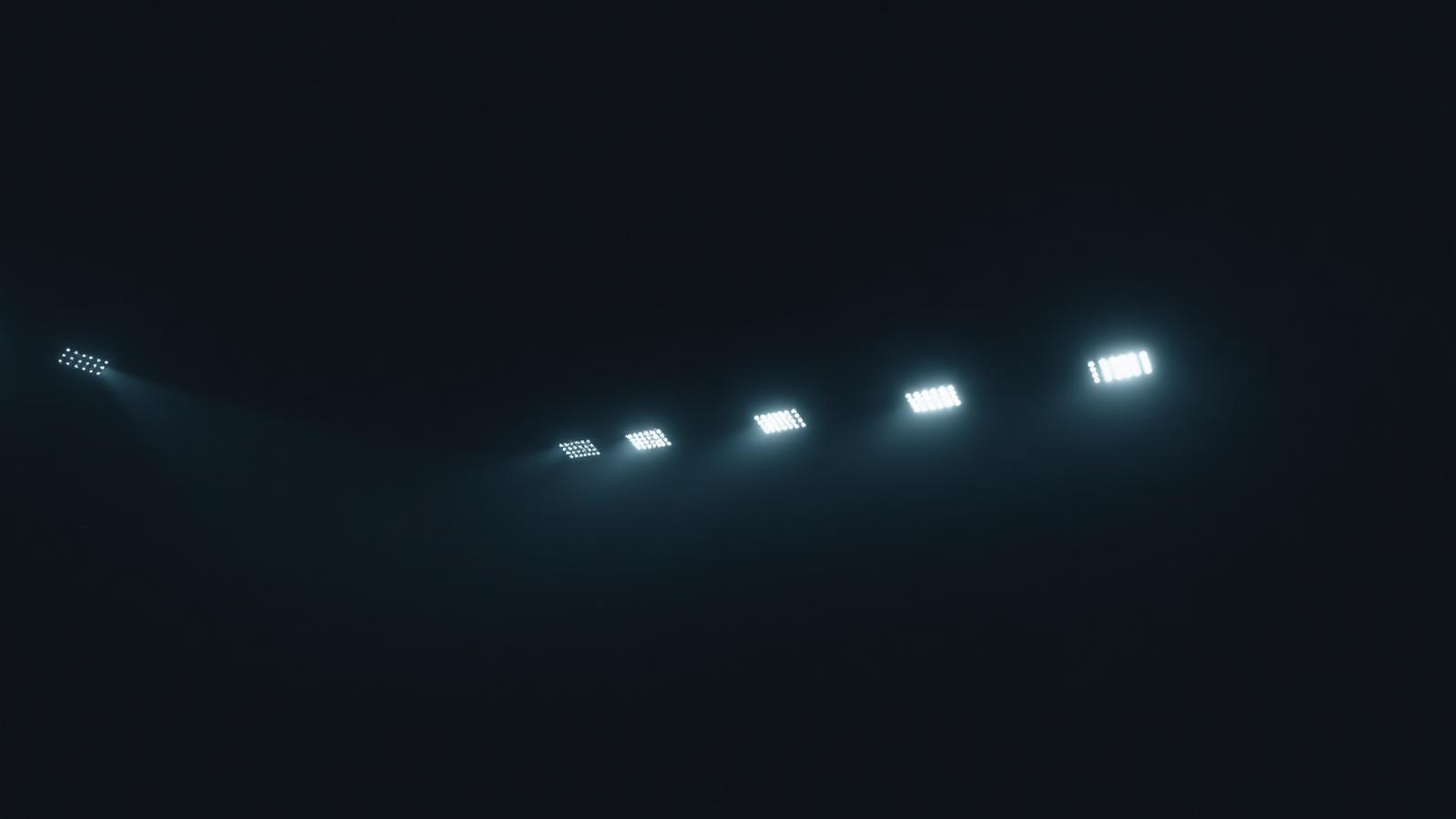 Stadium floodlights in fog